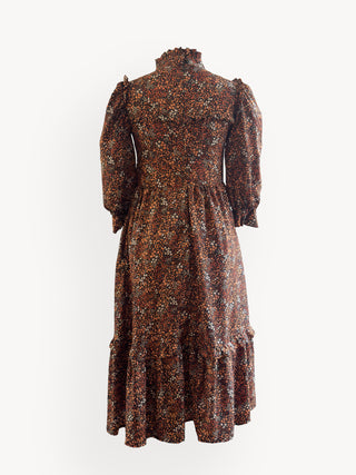 Floral patterned dress on a white background