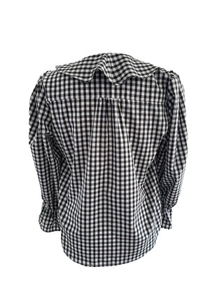 Black and white checkered blouse with puffed sleeves on a white background