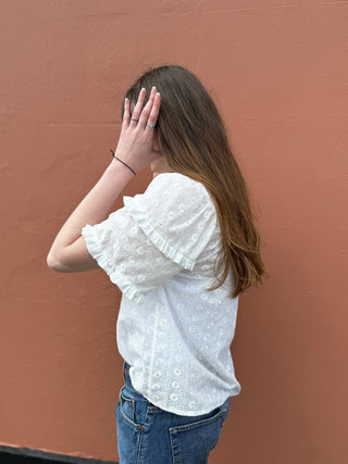 slow fashion white blouse ruffle sleeves the well worn