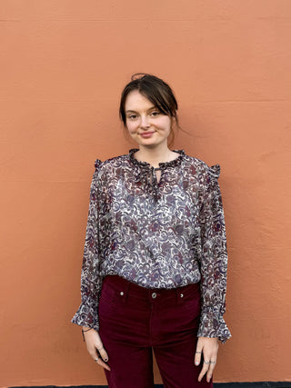 women wearing paisley boho blouse