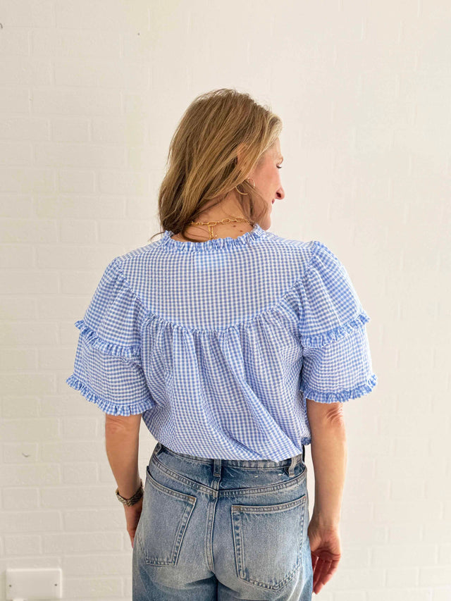 The Well Worn women wearing blue gingham top back detail