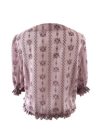 Light purple blouse with floral pattern on a white background