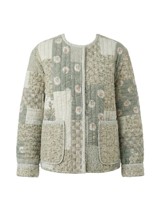 Patchwork jacket with floral patterns on a white background