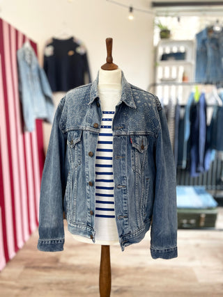 sashiko stitched denim jacket on mannequin
