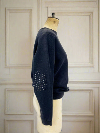 reworked sweatshirt on mannequin
