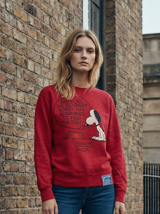model wearing red snoopy sweatshirt