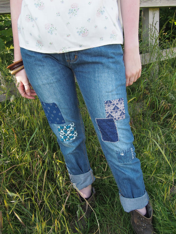 The Well Worn patched denim jeans