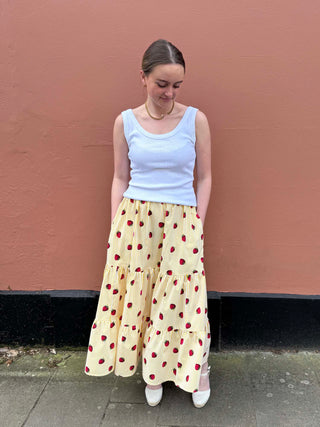 Handmade UK tiered maxi skirt featuring vintage-style strawberry print and vibrant yellow stripes