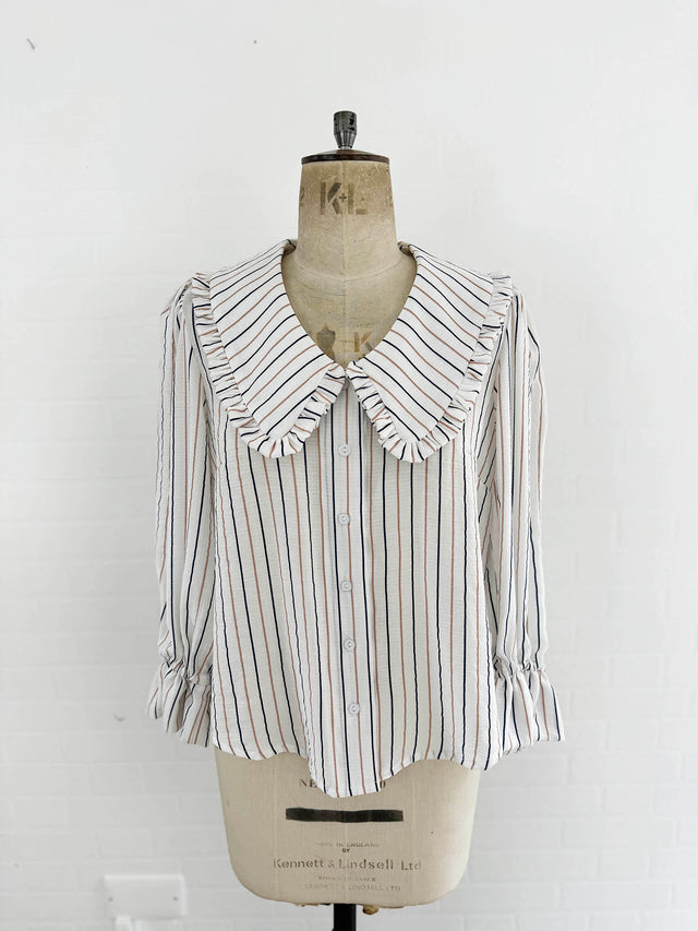 The Well Worn stripe blouse on mannequin