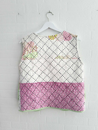 quilted waistcoat hanging on wall back
