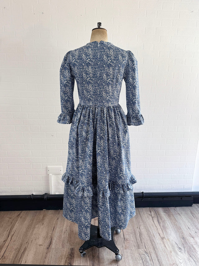 The Well Worn floral dress on mannequin back view