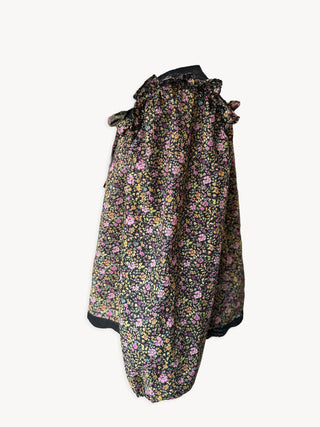 Floral dress with ruffled collar on a white background