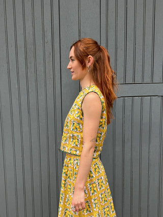 women wearing lemon print top
