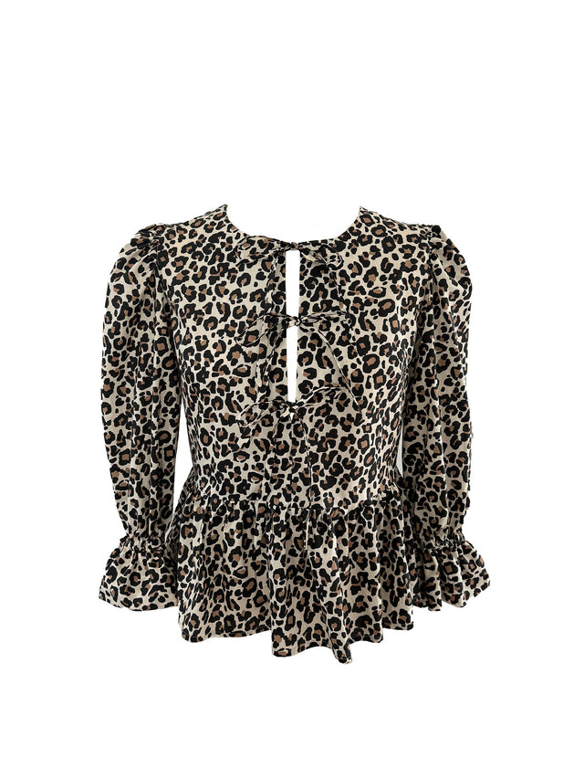 The Well Worn tie front leopard peplum top cut out