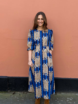 Model wearing The Well Worn Ada Dress in tiger stripe cotton, ethically made in the UK