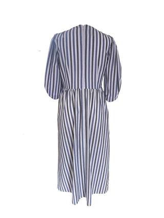 The Ottillie Striped Dress in blue & white stripes, featuring balloon sleeves, a V-neckline, and side pockets.


