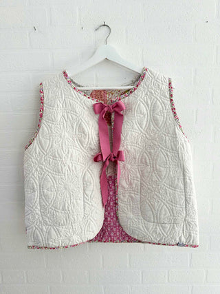 handmade quilted waistcoat on wall