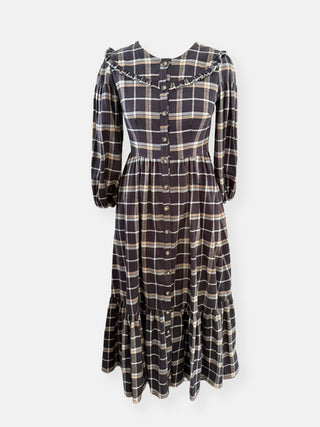 Plaid dress with long sleeves on a white background