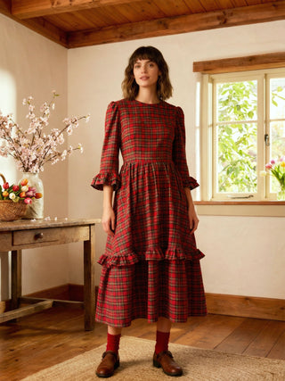 women in red tartan dress