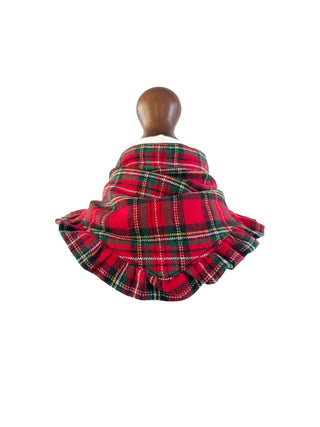 Red and green plaid skirt on a mannequin against a white background