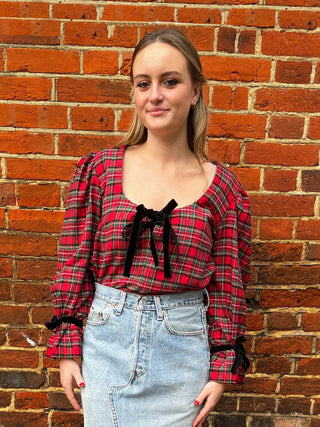 women wearing tartan top