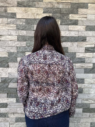 back view of women wearing pussy bow blouse made in uk
