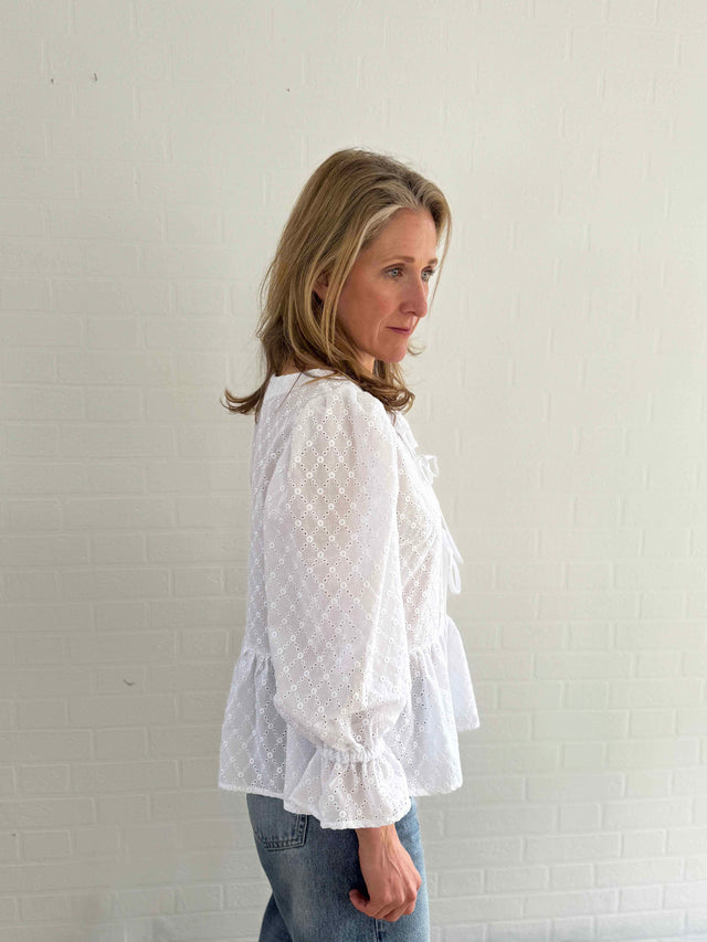 The Well Worn women wearing white broderie top sleeve detail