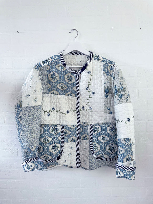 The Well Worn vintage quilt jacket on wall