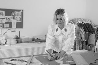 women at pattern cutting table