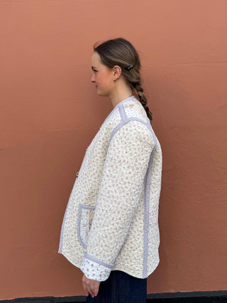 Upcycled beige quilted jacket featuring ric rac embellishment, ethical outerwear by The Well Worn