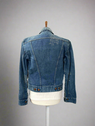 mended denim jacket on mannequin back