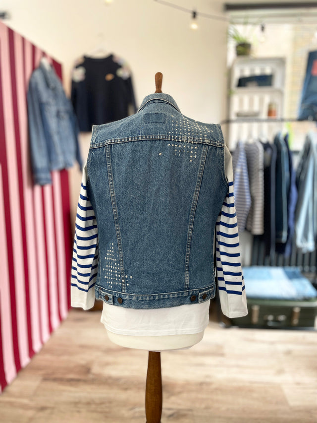The Well Worn upcycled denim waistcoat on mannequin back