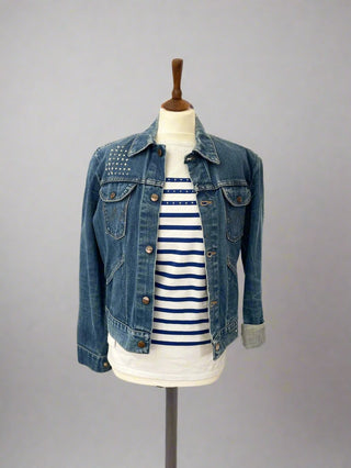 mended denim jacket on mannequin