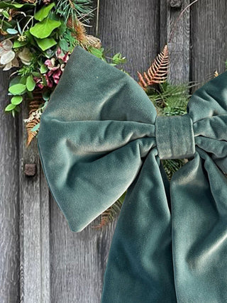 velvet bow on wreath on door