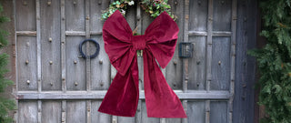pink velvet bow on door