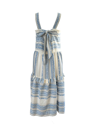 Striped dress with suspenders on a white background
