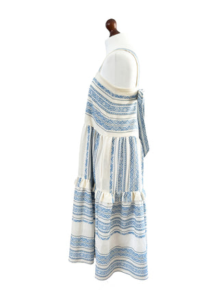 Mannequin wearing a long blue and white striped dress on a white background
