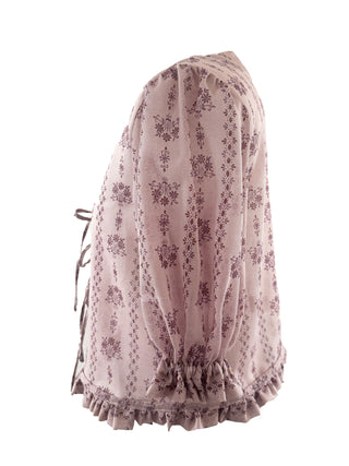 Floral-patterned dress with ruffled hem on a white background
