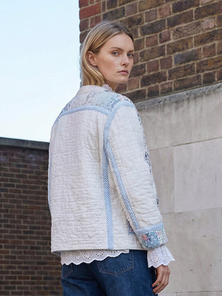 model wearing vintage quilt jacket