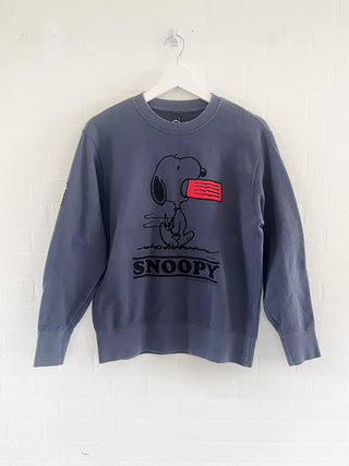 upcycled snoopy sweatshirt on hanger