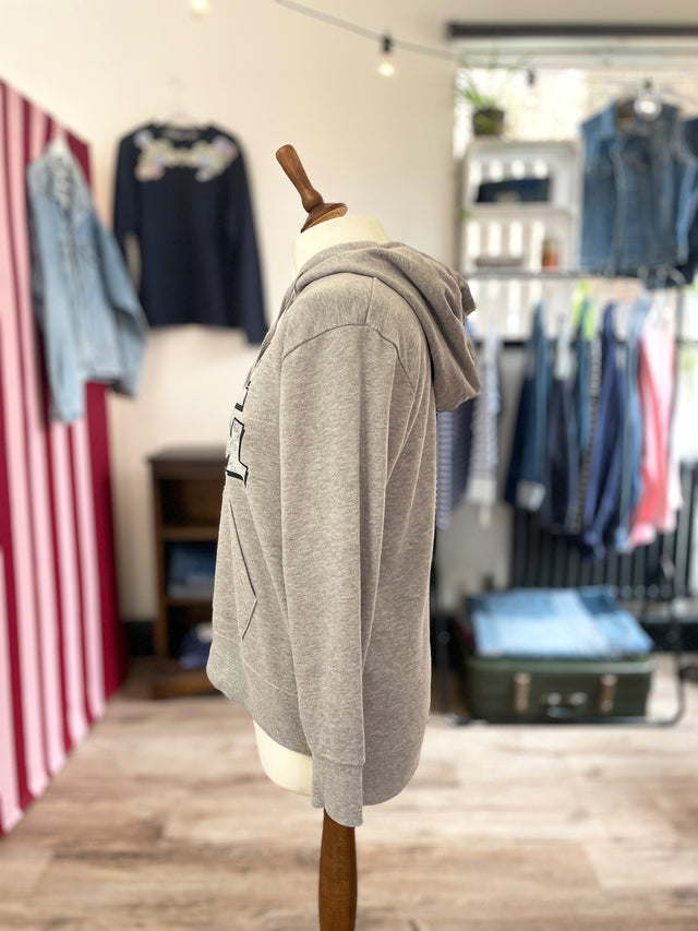 The Well Worn printed hooded sweatshirt on mannequin side
