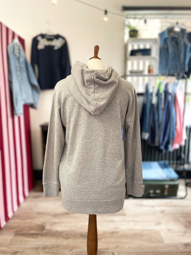 The Well Worn printed hooded sweatshirt on mannequin back