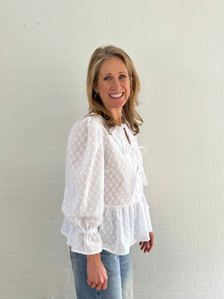 women wearing white broderie top fabric