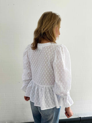 women wearing white broderie top back detail