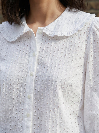 White blouse with floral pattern and ruffled collar