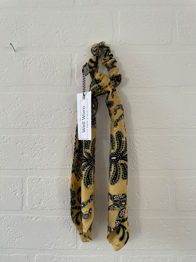 printed hair tie on wall leopard